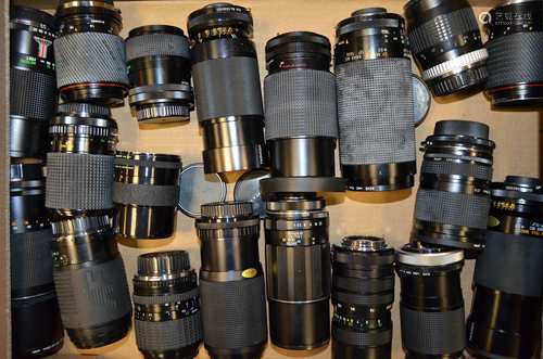 A Tray of Independent Lenses, including Hoya, Optomax, Sirius, Super Takumar, Tamron, Tokina,