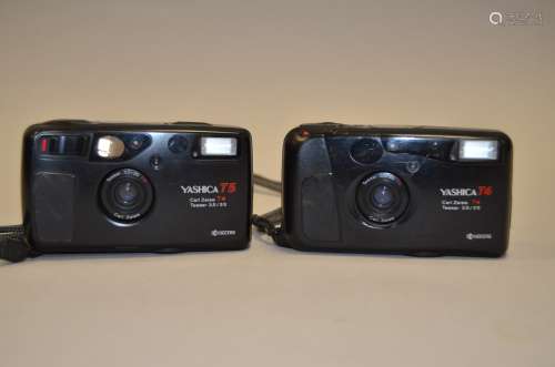 A Pair of Yashica T 35mm Compact Cameras, a Yashica T4 and T5 both black with Carl Zeiss Tessar 35mm