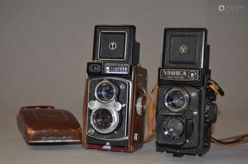 Two Yashica Mat Roll Film TLR Cameras, a Yashica-Mat 124 G, serial no 9080333, shutter working,