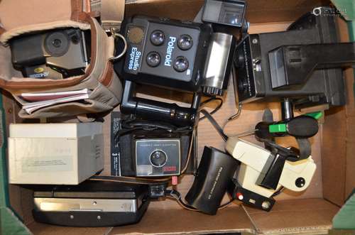 A Group of Polaroid Instant Cameras, including a Polaroid Studio Express, a Swinger Model 20, a