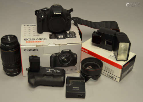 A Canon EOS 600D DSLR Camera Outfit, including Canon 600D body with battery grip BG-R8, EF-S 18-55mm