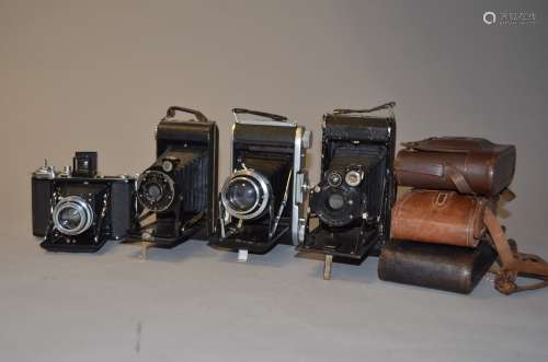 A Group of Folding Roll Film Cameras, Zeiss Ikon Ikonta (2 examples), Ensign Selfix, Six-20 Kodak