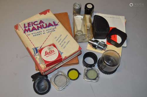 A Small Tray of Leica Literature and Accessories, including The Leica Manual (Morgan & Lester 1947),