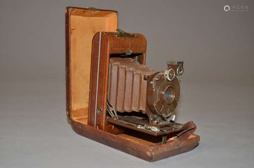 A Kodak Vest Pocket Series III Roll Film Folding Camera, brown body, brown bellows, with Kodak