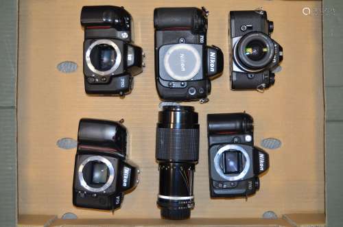 A Tray of Nikon 35mm SLR Bodies, a Nikon F100, a Nikon F80, a Nikon F70, a Nikon F60 together with a