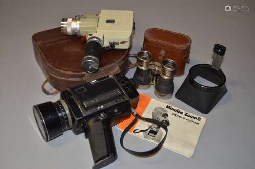 A Pair of Cine Cameras and Opera Glasses, a Minolta Zoom 8 Standard 8mm camera with owner's manual