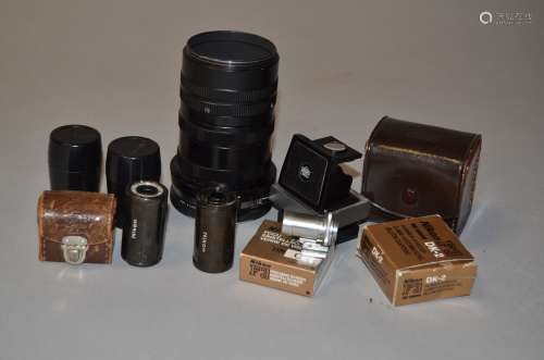 A Selection of Nikon Camera Accessories, including 13.5cm viewfinder in its case, reusable 35mm