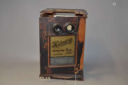 A Coin-Operated 'Kalloscop' Table-Top Stereoscopic Viewer, painted wood, circa 1910, P, case and