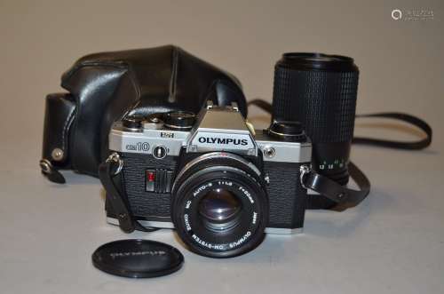 An Olympus OM10 SLR Camera and Accessories, serial no 259248, with Zuiko 50mm f/1.8 lens, maker's