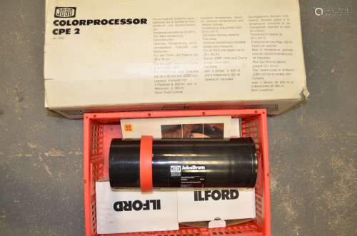 A Jobo Colorprocessor CPE 2, including Jobo Uni Tank, empty chemical bottles, measuring gauges and