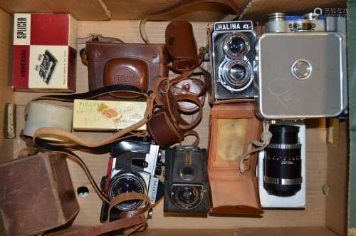 A Praktica L SLR Camera and other cameras, with a Meyer Oreston 50mm f/1.8 lens, aperture blades