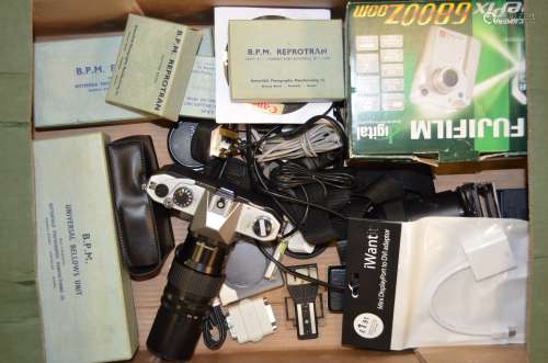 A Yashica TL Electro SLR Camera and Accessories, serial no 51204124, shutter speeds faulty, with