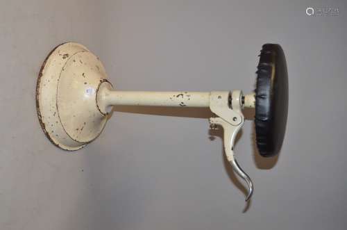 A cast-iron and plated steel Telescopic Stool, with circular spring-loaded base allowing