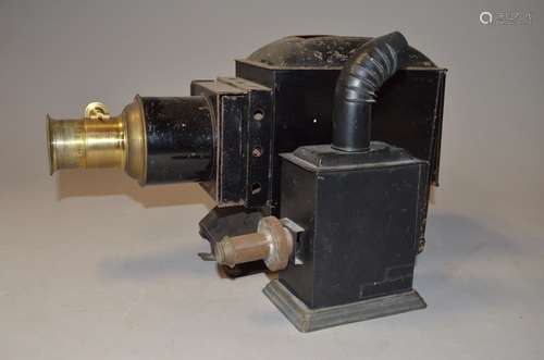 A British Magic Lantern, black enamelled, triple-wick illuminant and toy Falk lamp