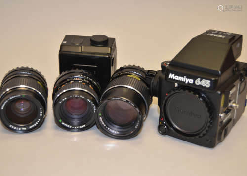 A Mamiya M645 Super Camera Outfit, including M645 body, untested, AE Prism Finder, two 120 film