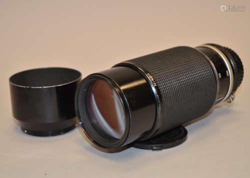 A Zoom Nikkor f/4 80-200mm Lens, serial no 309154, barrel F, elements F, internal dust