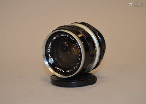 A Nikkor-S Auto 35mm f/2.8 Lens serial no 237660, barrel F, elements F, signs of separation on