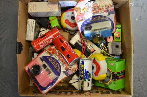 A Box of Novelty and Advertising Cameras, including Coca-Cola, Clownface, Crown White Gloss,