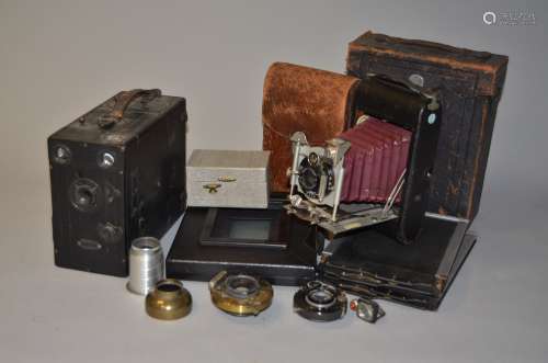A Krugener Red Bellows Folding Camera, including a Krugener Delta Folding Camera with Rapid-Periscop
