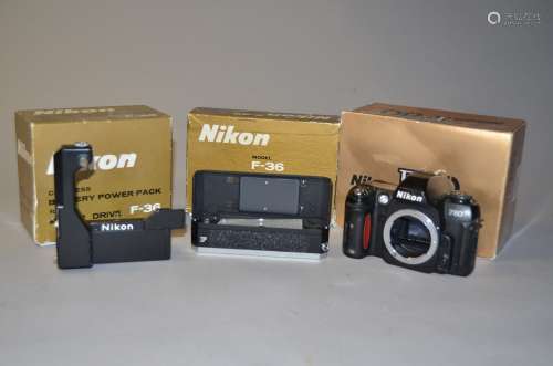 A Nikon F80 SLR Body, serial no 2092451, condition F, stickiness and marks on body, untested, with a
