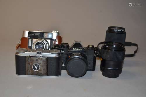 Cosina, Vöigtlander and Zeiss Ikon 35mm Cameras, a Cosina CT-1A SLR body, shutter working, meter