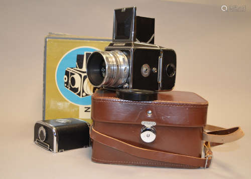 A Zenith 80 Roll Film SLR Camera Outfit, shutter jammed, with a Vitoflex 80mm f/2.8 lens and two