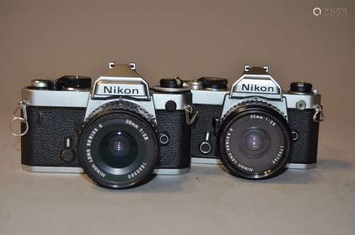 A Nikon FE and a Nikon FM SLR Cameras, a chrome FE, serial no 4059699, condition F, with a Nikon