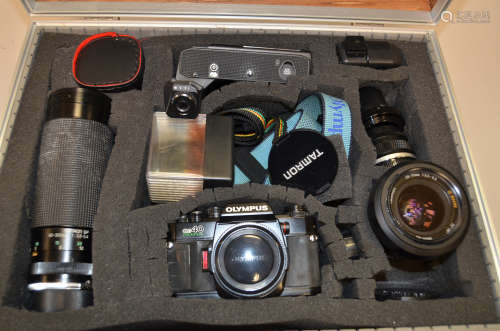 An Olympus OM40 Program SLR Camera Outfit, including Olympus OM40 body, Zuiko Auto-S 50mm f/1.8