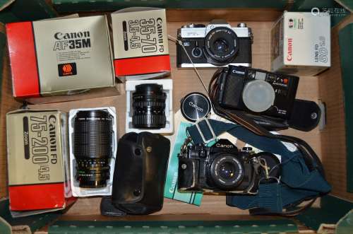 Canon SLR Cameras and Lenses, A Canon A1 camera, serial no 2380189, a Canon FTbN camera, serial no