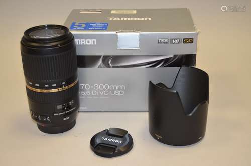 A Tamron SP 70-300mm f/4-5.6 VC USD zoom lens, Canon EF mount, serial no 201200 with lens hood,