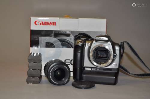 A Canon EOS 300D DSLR Camera and Lenses, body F, slight tackiness around side and back of battery