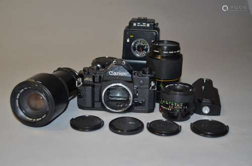 A Canon A1 SLR Camera Outfit, including Canon A1 body, serial no 1845926, Canon lenses, 28mm f/2.