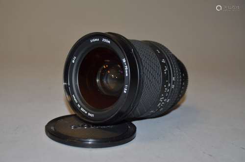 A Sigma 28-70mm f/2.8 Nikon F AI Mount Lens, serial no 1004203, barrel G, slight tackiness, elements