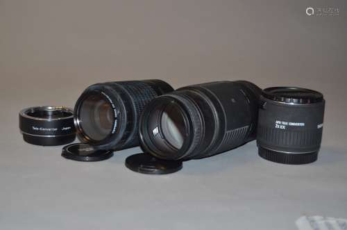 A Group of Sigma AF Lenses, a 75-300mm f/4.5-5.6 AF-APO lens in Canon EF mount, an APO Tele