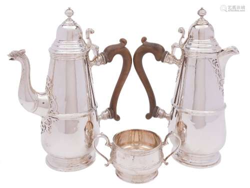 A George V matched silver three-piece coffee service: maker Mappin & Webb, London,