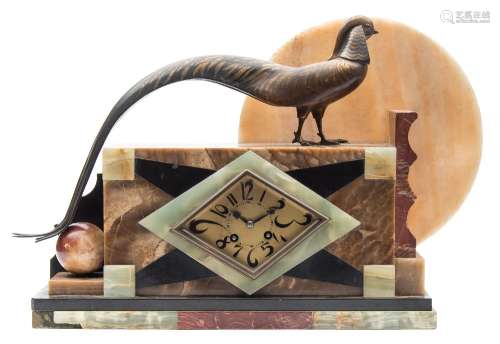A marble and bronze Art Deco mantel clock: the eight-day duration French movement striking the