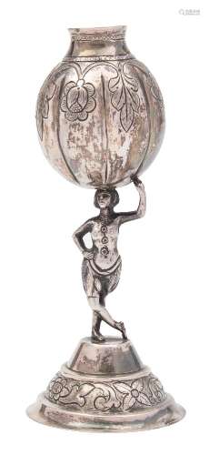 An Argentinean silver bombilla: the ovoid bowl supported on a semi-nude female figure standing on a