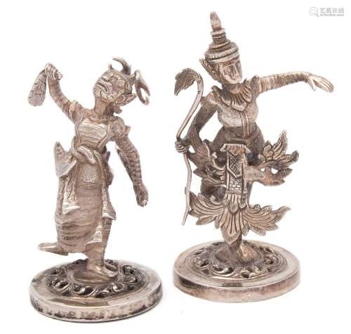 A pair of Burmese silver novelty menu or place name holders: modelled in the form of dancers in