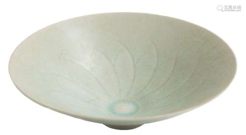 A Chinese Qingbai porcelain bowl: of flared conical form, covered in a crackled pale blue glaze,