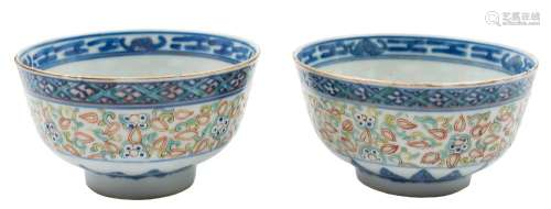 A pair of Chinese rice bowls: painted in underglaze blue, iron red,