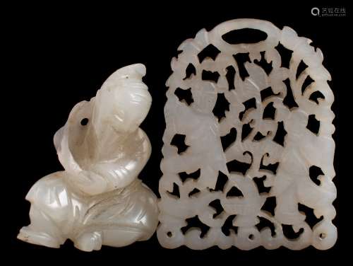 A Chinese jade boulder pendant and two small pendants: the first in the form of Shao Lao wearing
