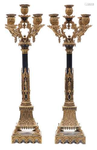 A pair of Willian IV patinated gilt-metal five-light candelabra: of neo-gothic form in the manner