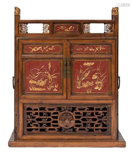 A Chinese wood, red lacquer and gilt decorated brass mounted floor cabinet:,