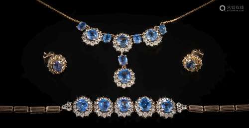 A suite of 'Ceylon' blue and white sapphire mounted jewellery: with necklace,