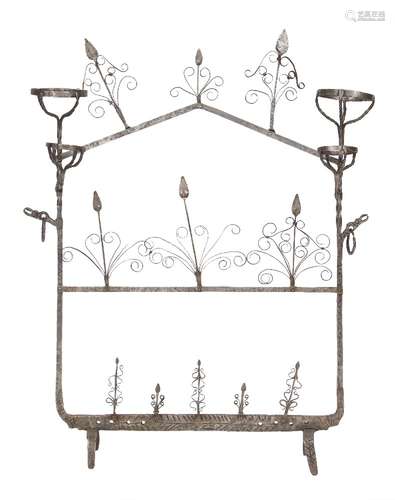 A polished steel lantern rack in the 17th century style with four brazier-type apertures.