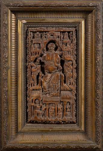 A Continental small carved oak religious panel: probably 18th century depicting a central seated