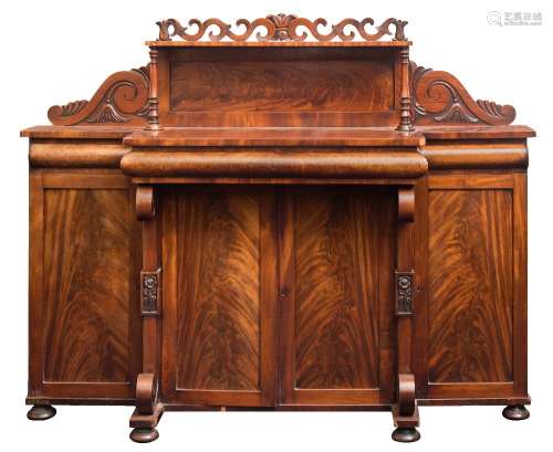 A Victorian carved mahogany breakfront chiffonier:,