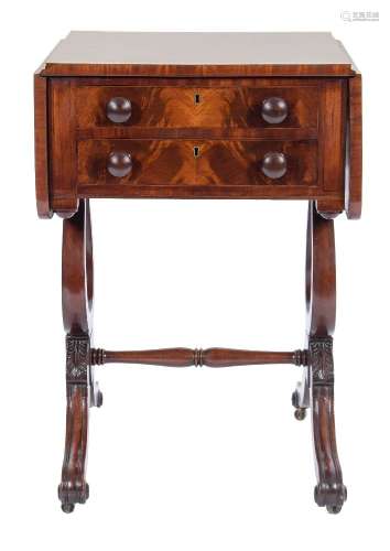 An early 19th Century mahogany drop flap work table:, the hinged top with rounded corners,