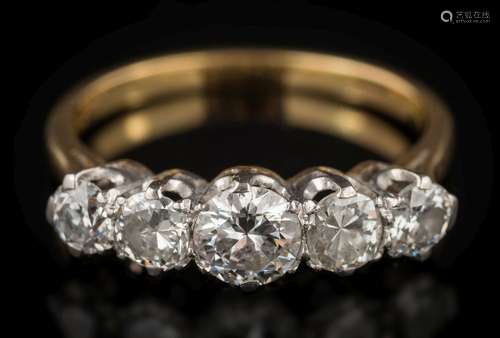 A graduated diamond five-stone ring: the round old, brilliant-cut diamonds approximately 0.20ct, 0.