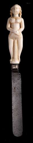 A late 18th/early 19th century steel blade knife: the carved ivory handle in the form of a nude